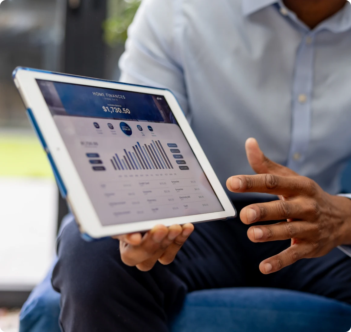 Tablet displaying financial data and graphs